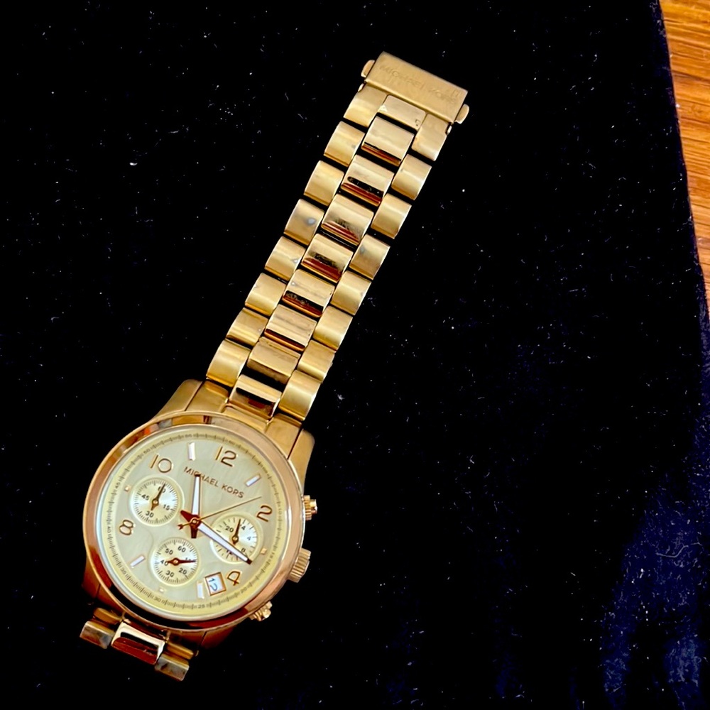 Michael Kors gold women’s watch